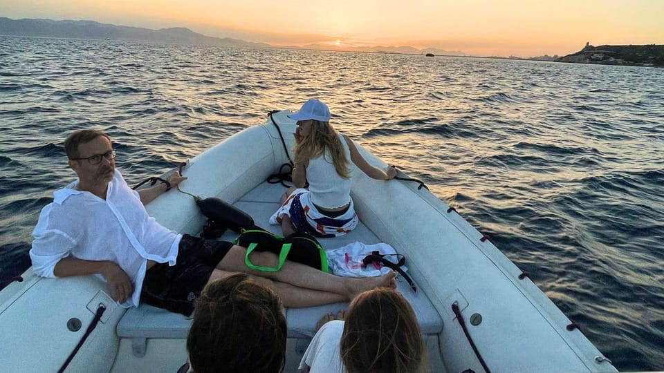 From Cagliari: Sunset Dolphin Watching Tour - Boat and Amenities