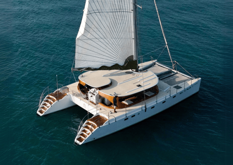 From Samui: Koh Som Sunset Trip by Luxury Catamaran - Booking and Reservation