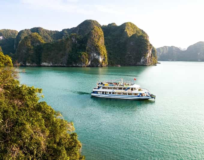 Halong Full Day Cruise: Kayak, Cave, Lunch, Beach & Island - Activities and Attractions