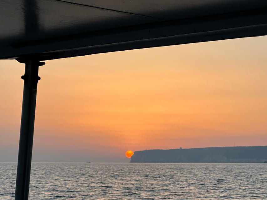 Lampedusa: Sunset Boat Tour With Aperi-Dinner and Dolphins - Onboard Experience