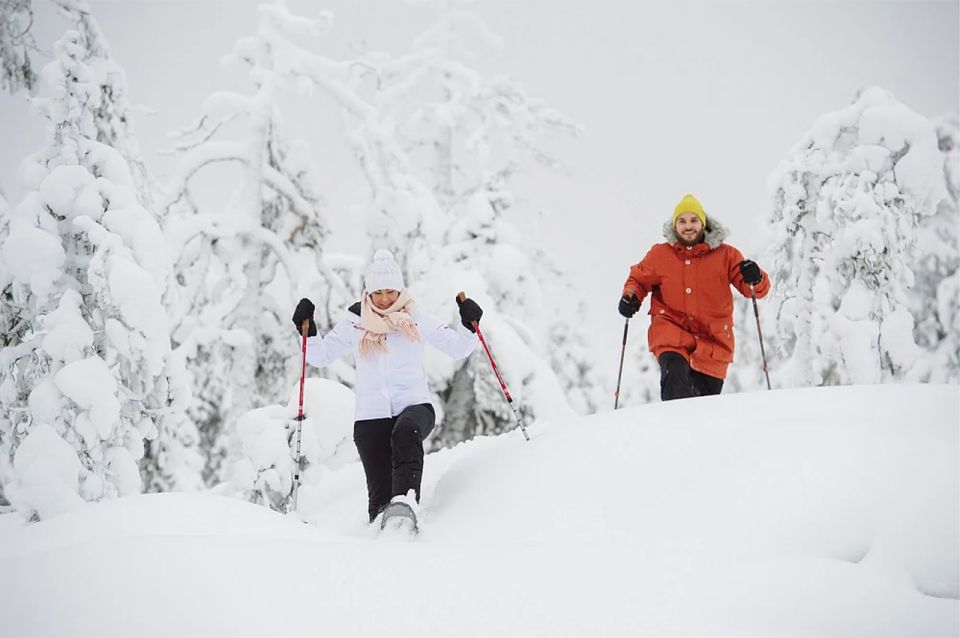 Lapland: Hiking, Ice Fishing, Floating & BBQ Snow Adventure - Unique Floating Experience