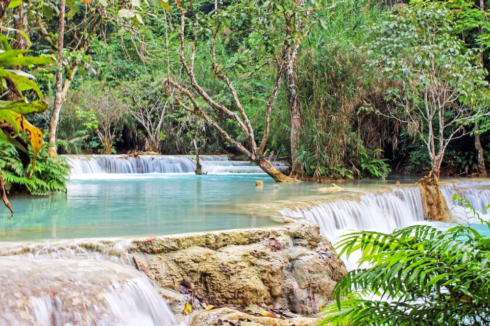 Luang Prabang: Kuang Si Bike Ride & Long-Tail Boat Cruise - Included Features and Amenities