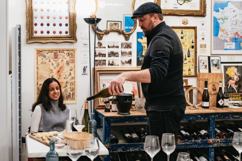 Paris: Wine Tasting Experience With 6 Wines and Cheese Board - Host and Atmosphere