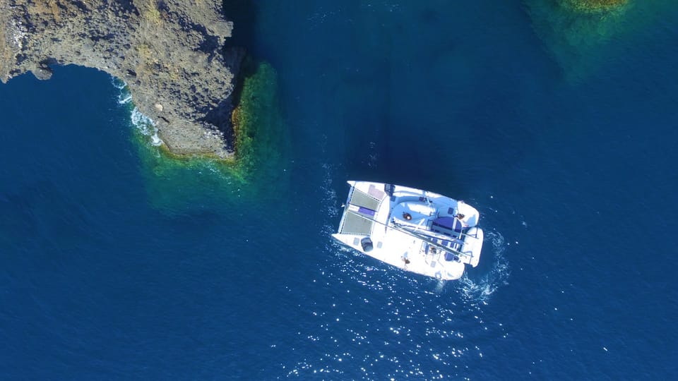 Santorini: Private Catamaran Cruise With Food & Drinks - Onboard Experience