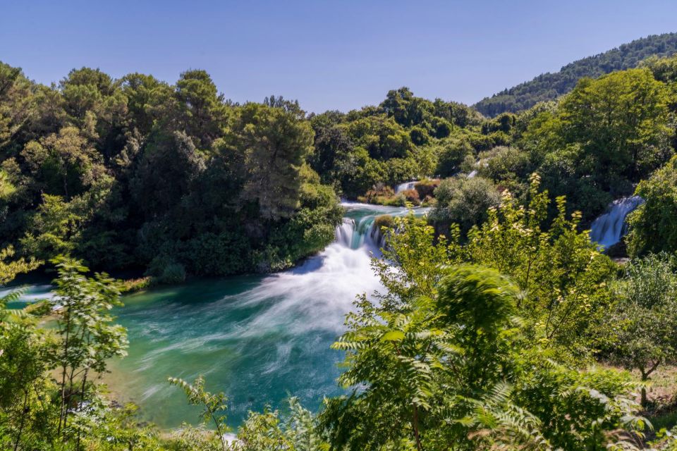 Split: Krka Waterfalls Guided Day Trip With Swim & Boat Tour - Boat Cruise on Krka River