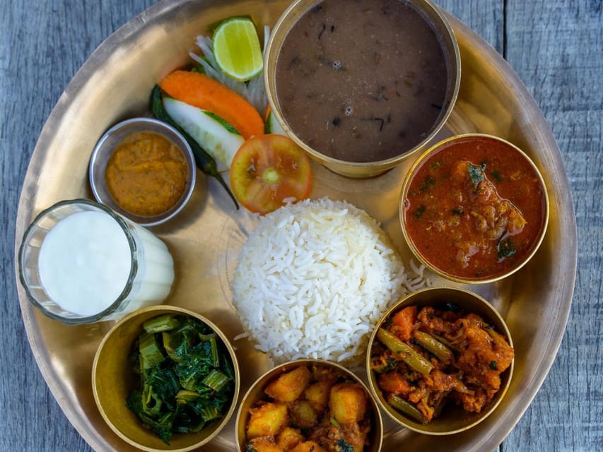 Traditional Nepali Thali Dining at AtomiX Bar and Grill - Logistics and Meeting Details