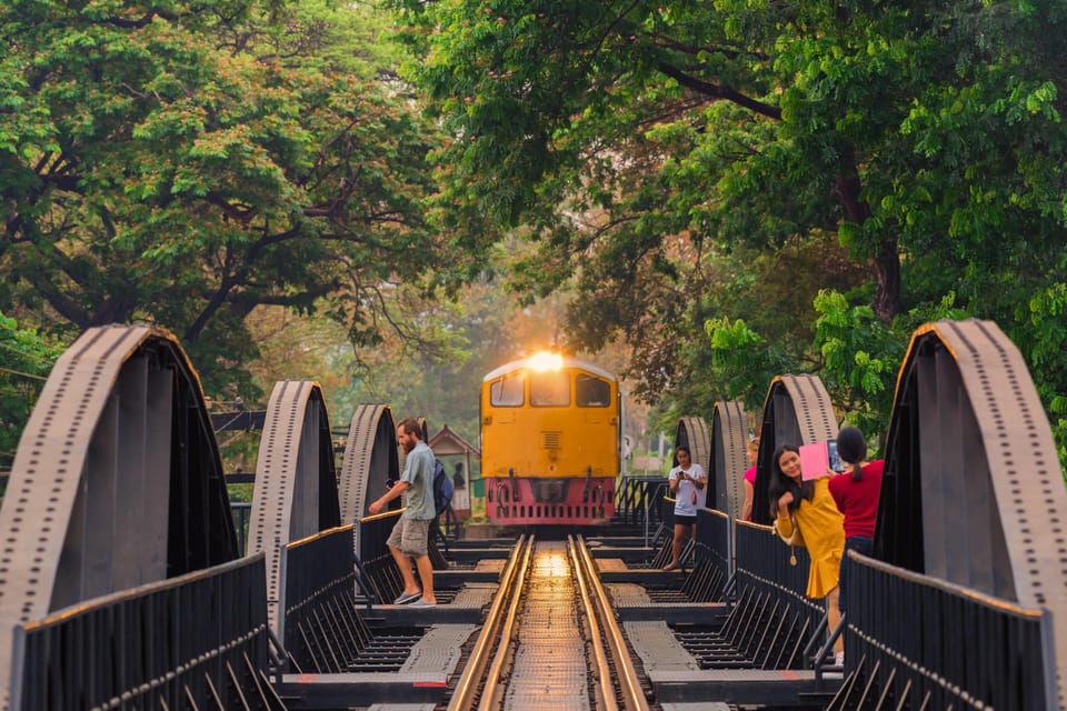 Bangkok: Private Day Tour to Erawan Waterfall & Kanchanaburi - Exploring Erawan Waterfalls