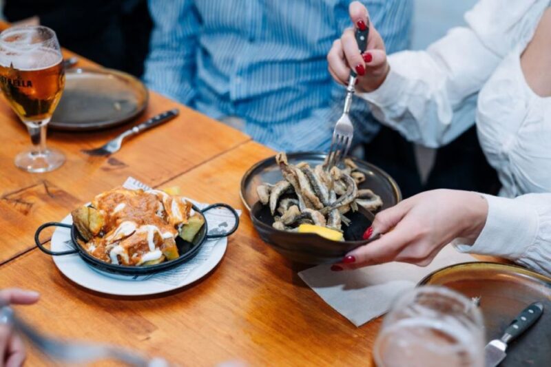 Barcelona: the Born Food Walking Tour With Tapas and Drinks - Exploring the Neighborhoods