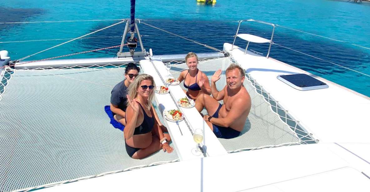 Chania: Private Day Catamaran Cruise With Swimming and Meal - Tips for a Memorable Experience