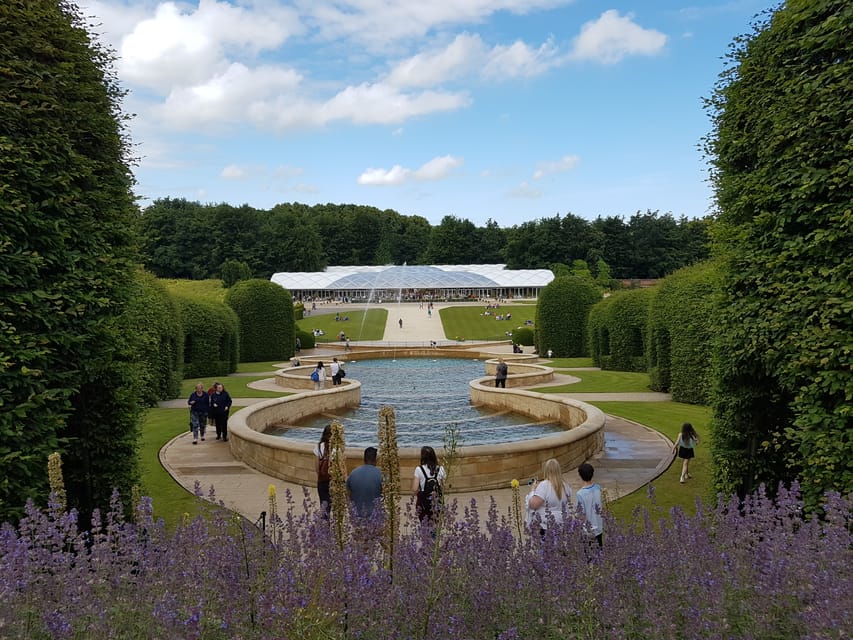 From Edinburgh: Holy Island, Alnwick Castle & Northumbria - Exploring Alnwick Garden