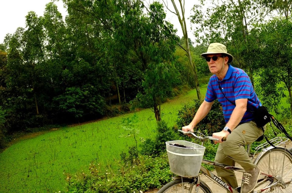 From Hanoi: 1-Day Duong Lam Ancient Village Tour and Biking - Ngo Quyen & Phung Hung Temples