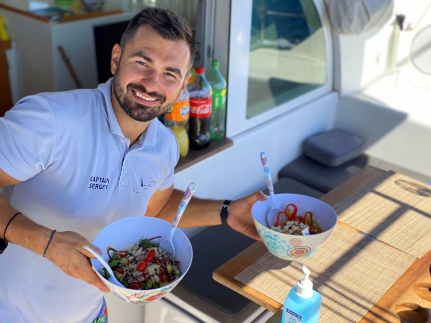 Hersonissos: Sunset Catamaran Trip With Finger Food & Drinks - Booking Requirements