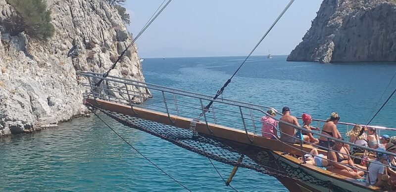 Kos: 3-Island Cruise With Greek BBQ Lunch and Swimming - Languages Offered