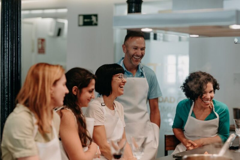Madrid: Paella & Tapas Cooking Class With Local Market Visit - Age Restrictions