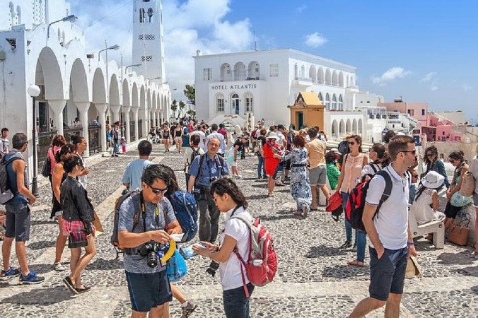 Santorini: Fira Town Walking Tour With Wine Tasting - Cancellation Policy and Language