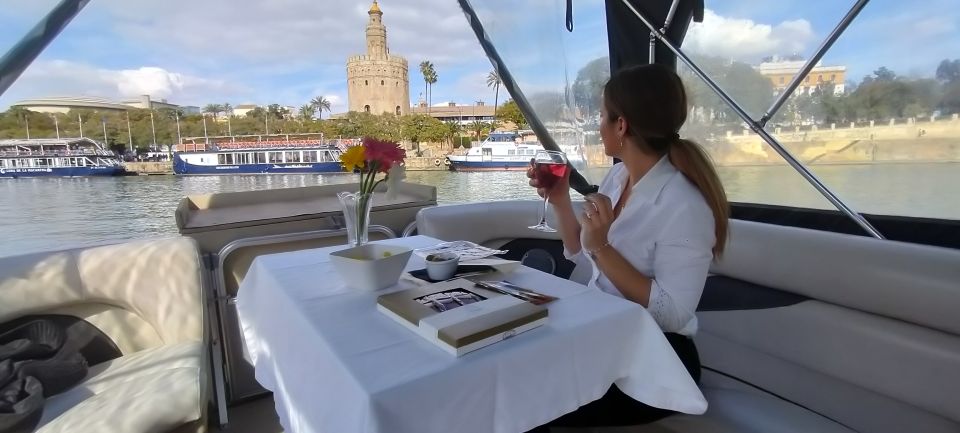 Seville: Exclusive River Boat Tour With Tapas - Meeting Point