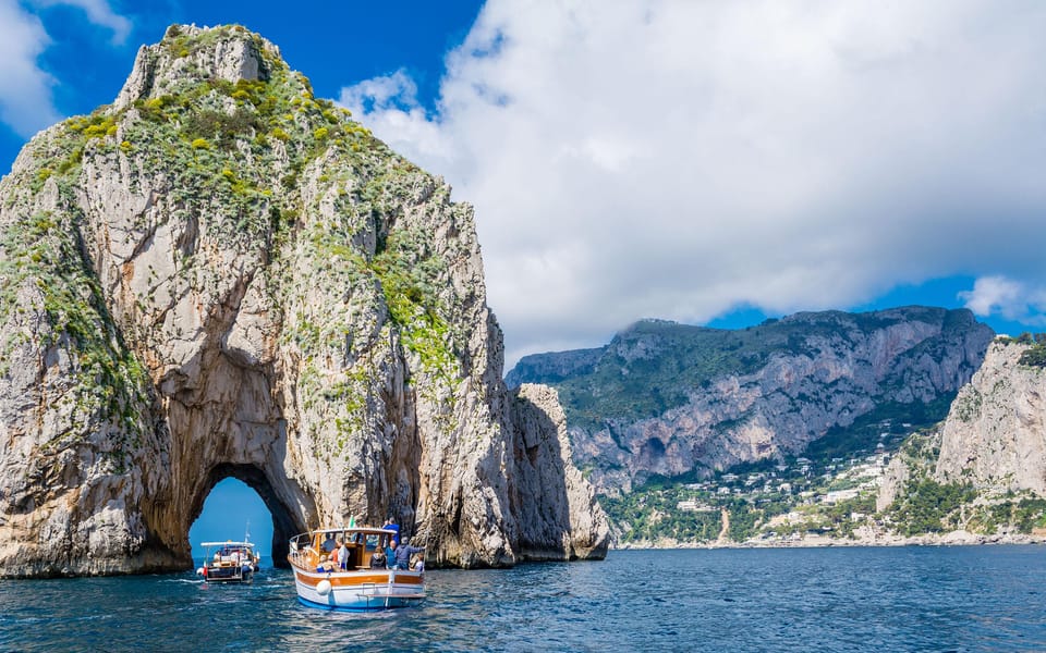 From Amalfi: Group Boat Tour to Capri With Drinks & Swimming - Frequently Asked Questions