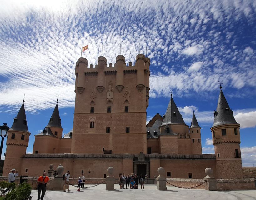 From Madrid: Full Day Tour to Avila and Segovia With Alcazar - Transportation