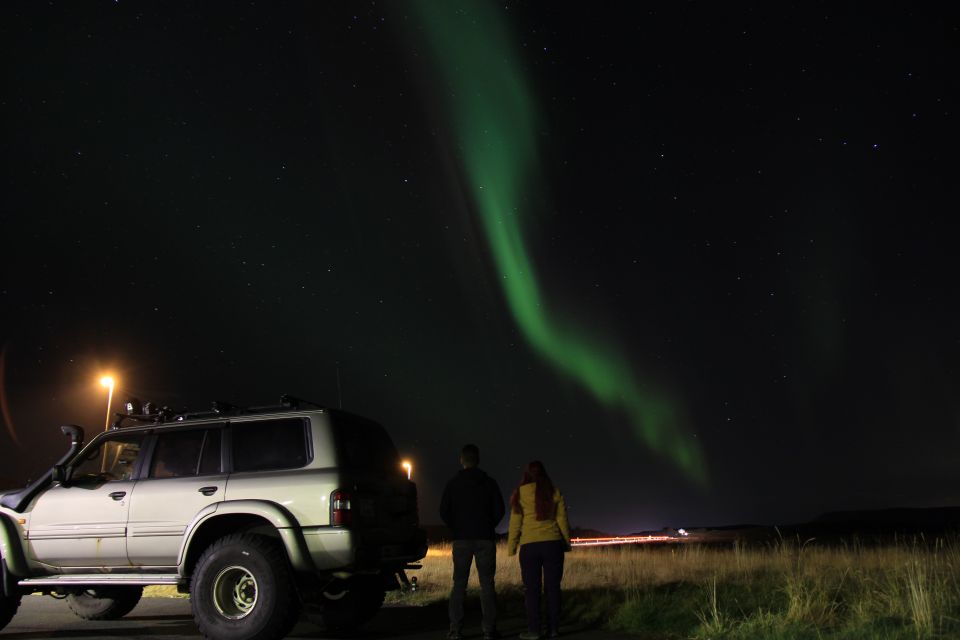 From Reykjavík: Spot the Northern Lights With Snacks & Drink - Participant Restrictions