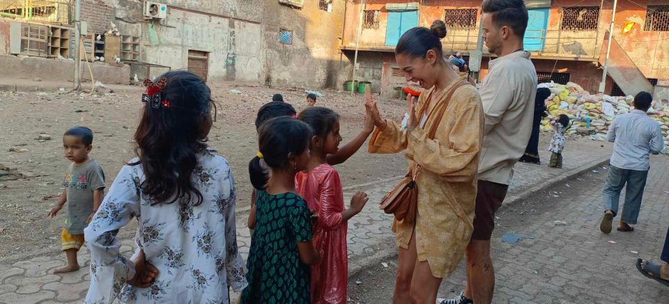 Mumbai:Slum Tour Dharavi Small Group by Local -Support Local - Meeting Point Logistics