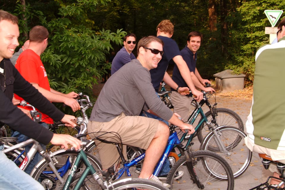 Munich: Evening Bike Tour With Beer Garden Visits - Meeting Point and Accessibility