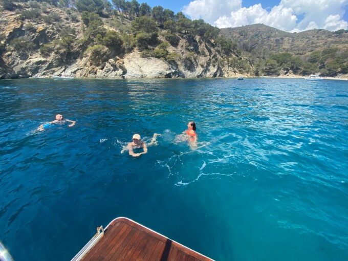 Roses: Boat Trip With Kayak, Paddle Surf & Snacks - Vessel and Equipment
