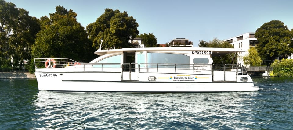 Berlin: Sunset Catamaran Cruise With Audio Guide - Weather and Vessel Information