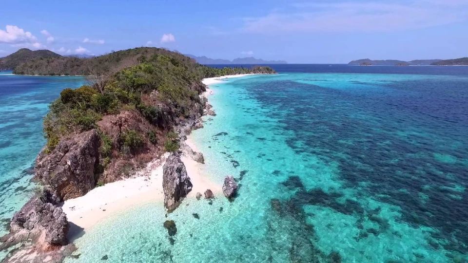 Coron: Coastal Cliffs, Beach & Malcapuya Island Hopping Tour - Pickup and Group Options