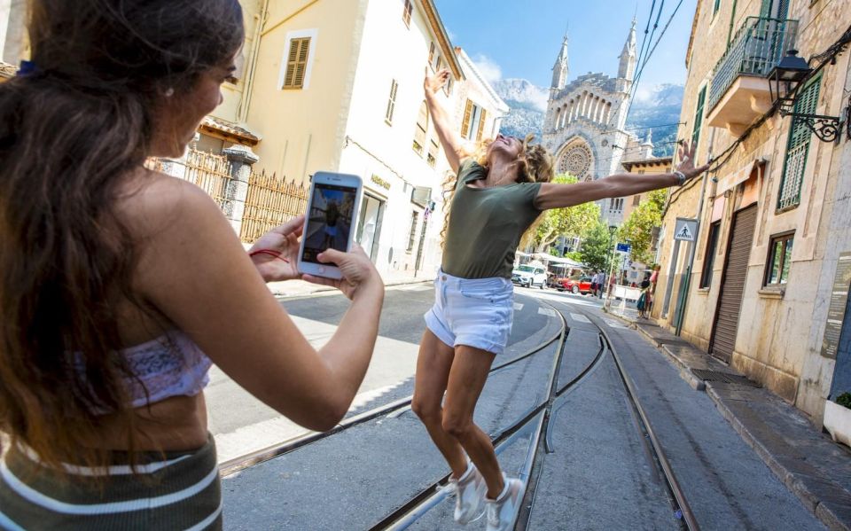 From Alcúdia: Soller Train and Tram Half Day Tour - Tram Ride to Port De Soller