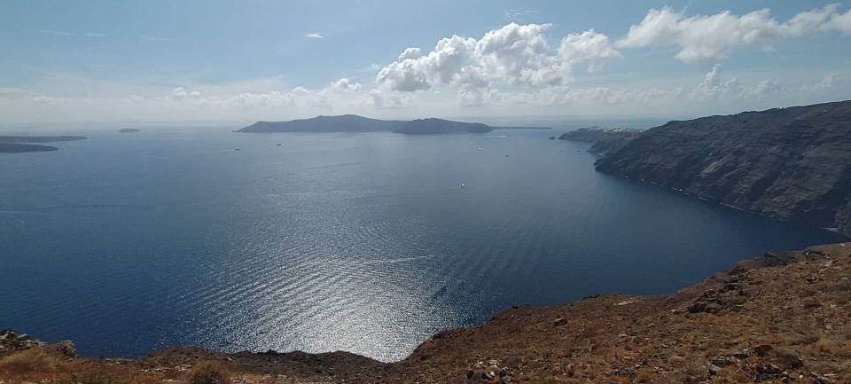 From Santorini: Guided Oia Morning Tour With Breakfast - Exploring Three Bells of Fira