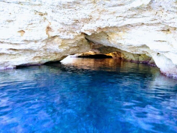 Ibiza: Sea Caves Snorkeling and Paddle Boarding Tour - Visiting a Pirate Cave