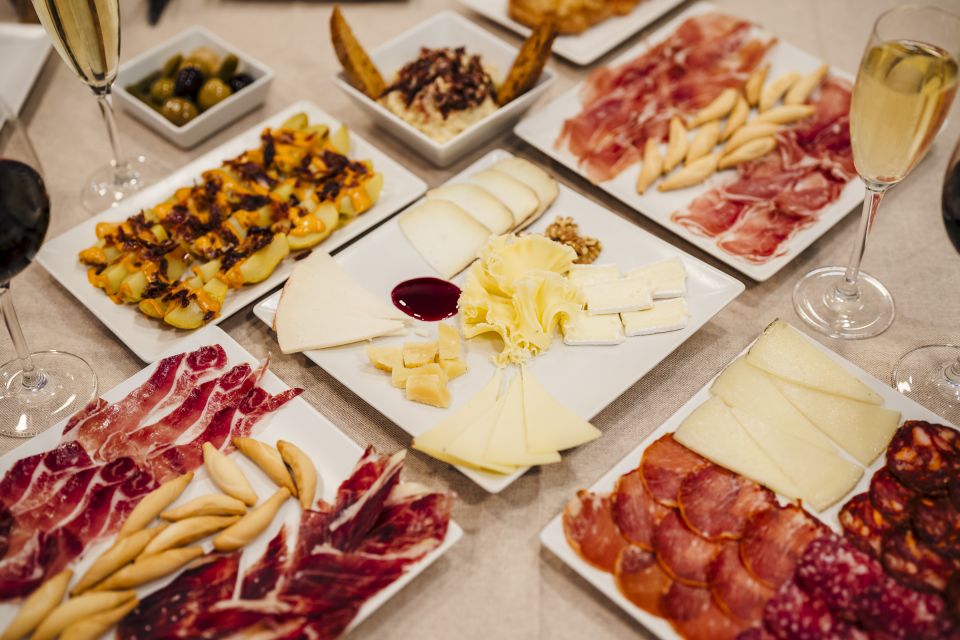 Jamón, Cheese and Wine Experience Near Sagrada Familia - Cheese and Embutidos Offerings