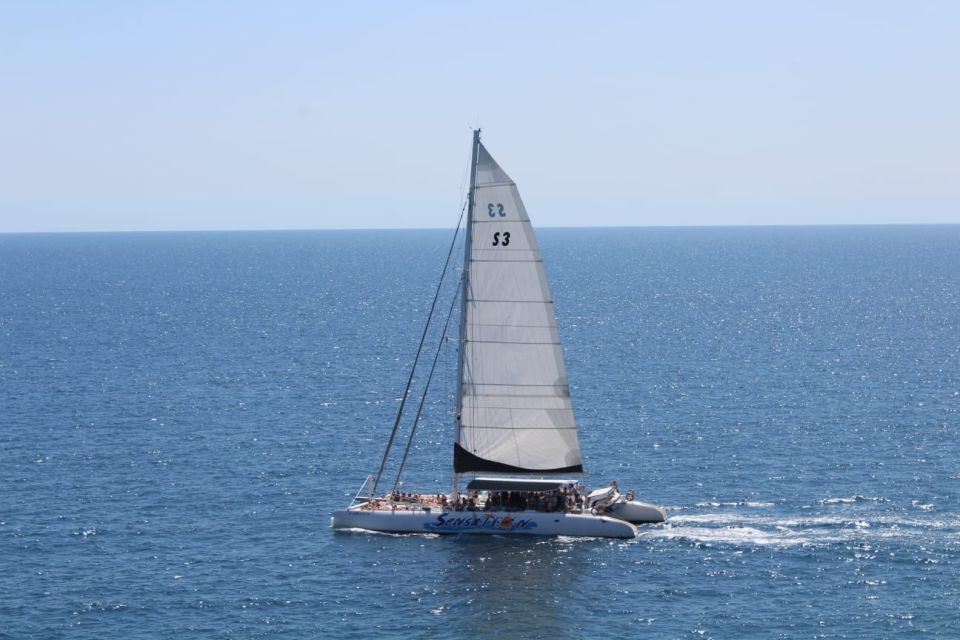 Lloret De Mar: Sunset Catamaran Cruise With DJ and Drinks - Group Size and Restrictions