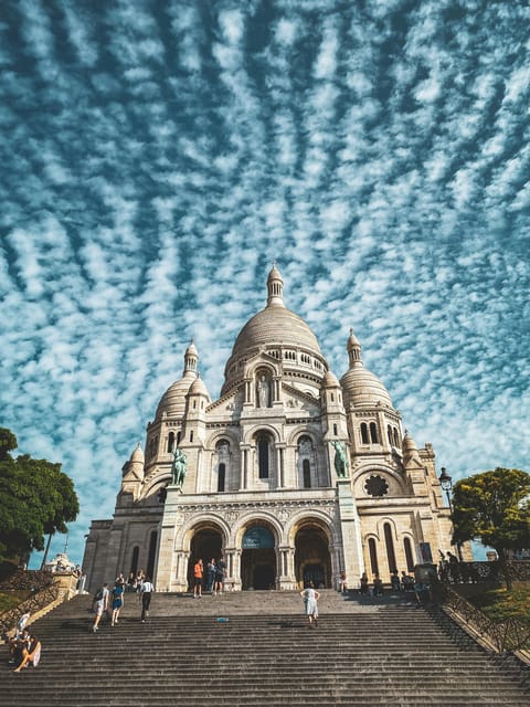 Paris: Montmartre Guided Walking Tour & Sacré-Cœur Dome - Tour Highlights