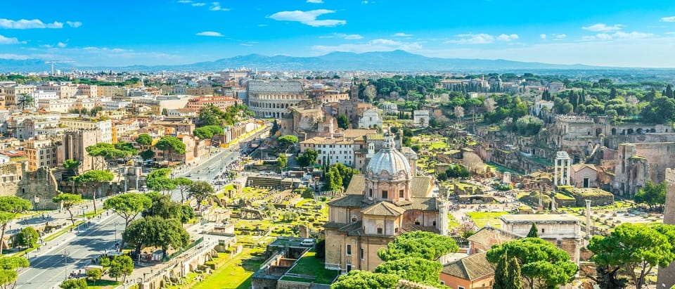 Rome: Colosseum and Roman Forum Experience With Audio Guide - Architectural Brilliance of Colosseum