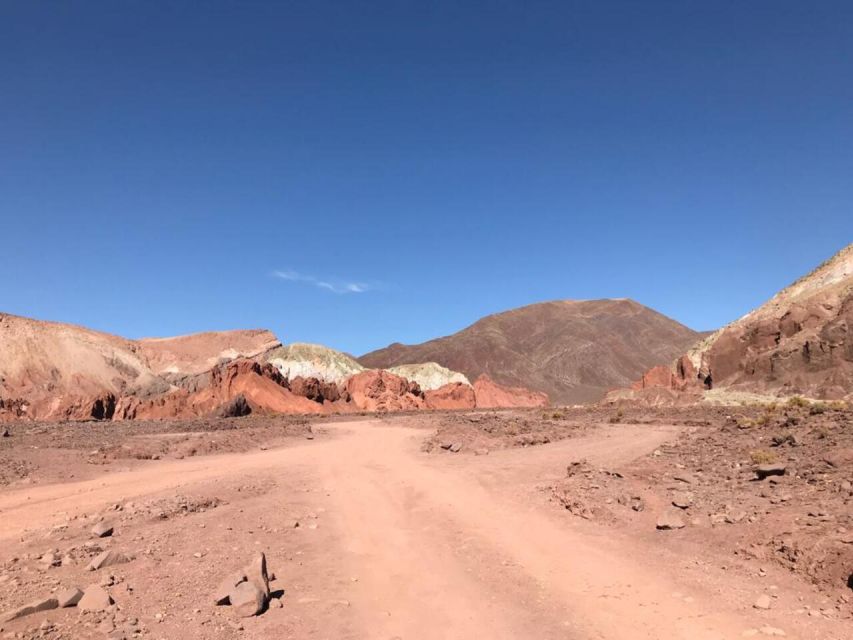 San Pedro De Atacama: Rainbow Valley & Hierbas Buenas Tour - Pricing and Group Size