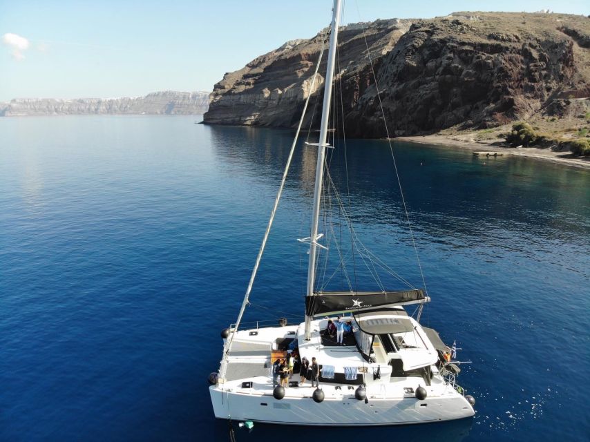 Santorini: Catamaran Cruise With Meal & Open Bar - Booking and Cancellation