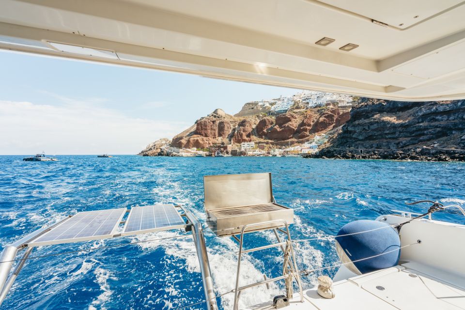 Santorini: Luxury Catamaran Day Trip With Meal and Open Bar - Cancellation Policy