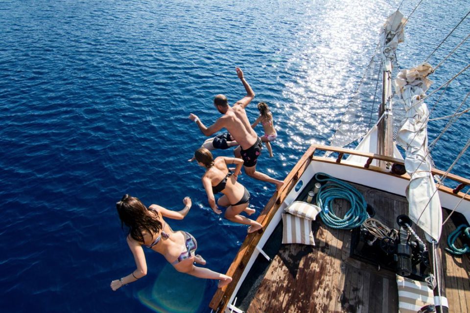 Santorini: Volcanic Sunset Cruise With Dinner - Booking and Cancellation Policy