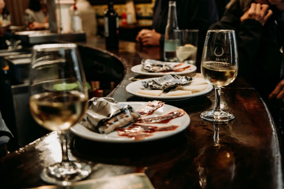 Seville: Tapas, Taverns, and History Walking Tour - Taking in Local Culture