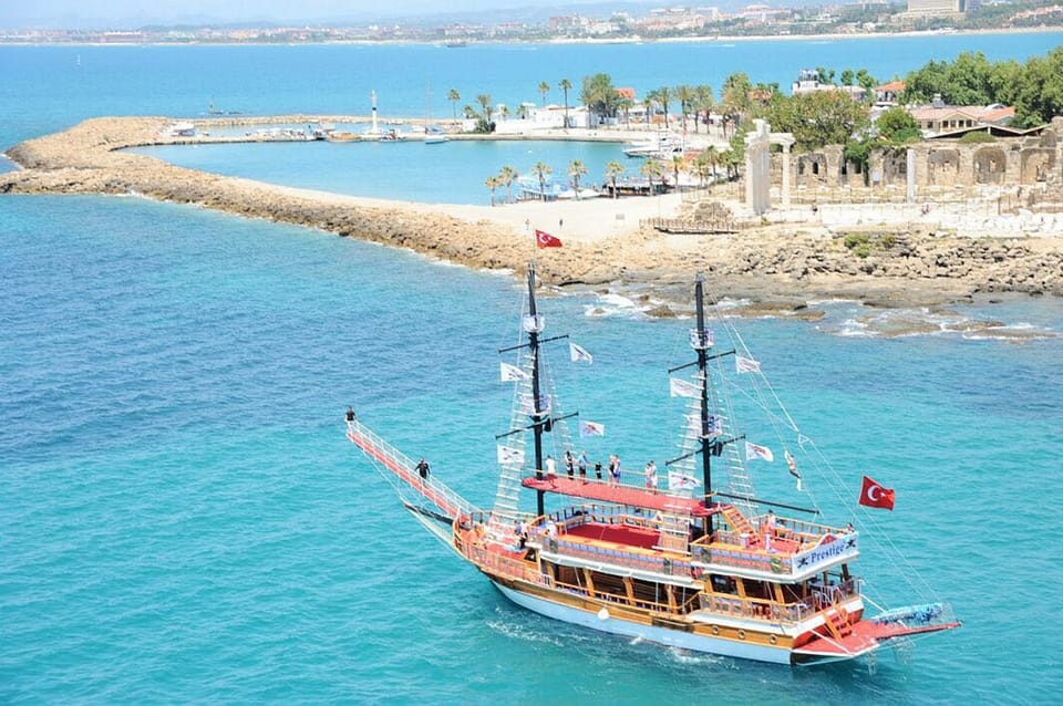 Side: Dolphin Island Boat Tour With Lunch And Soft Drinks - Languages Offered