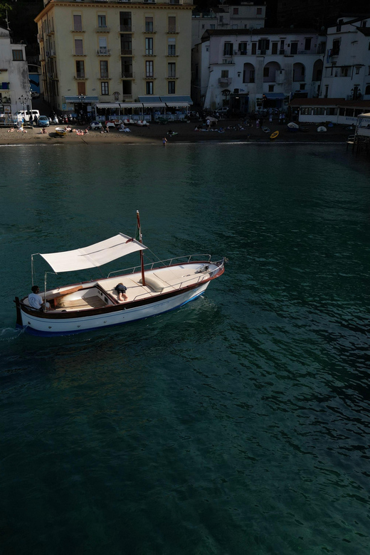 Sorrento: Gozzo Boat Coastal Cruise With Swim and Limoncello - Coastal Sights and Activities