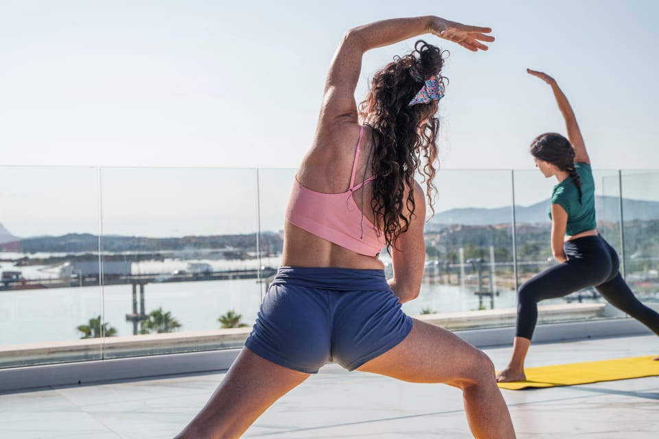 Yoga Rooftop Experience in Olbia - Cancellation Policy