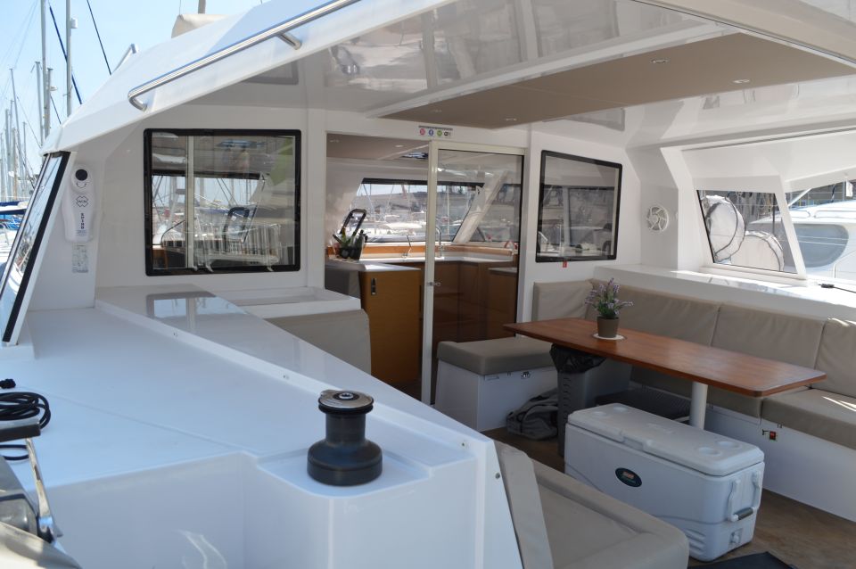 Barcelona: Private Catamaran Sailing With Drinks and Snacks - Professional Skipper Included