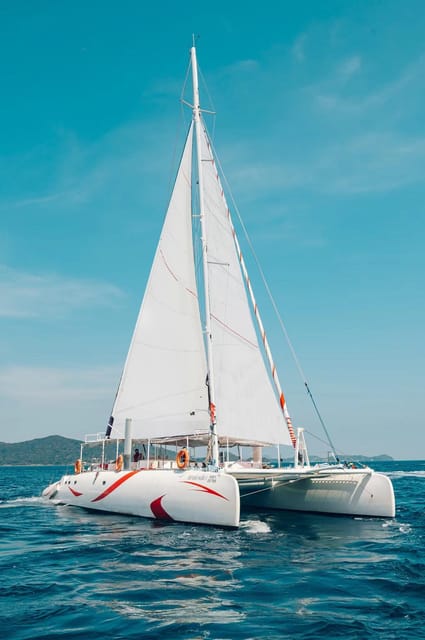 Coral & Racha : Smilerainbow Catamaran Tour With Waterslide - Return to Pier and Hotel