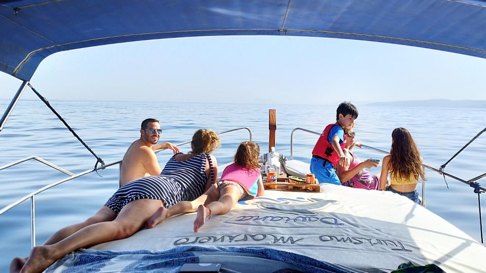 Estepona: Boat Trip Dolphin Search With Drink and Snacks - On-board Activities and Amenities