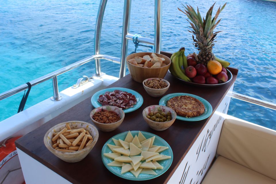 Ibiza: Scenic Cruise With Tapas and Drinks - Enjoy Onboard Activities and Refreshments