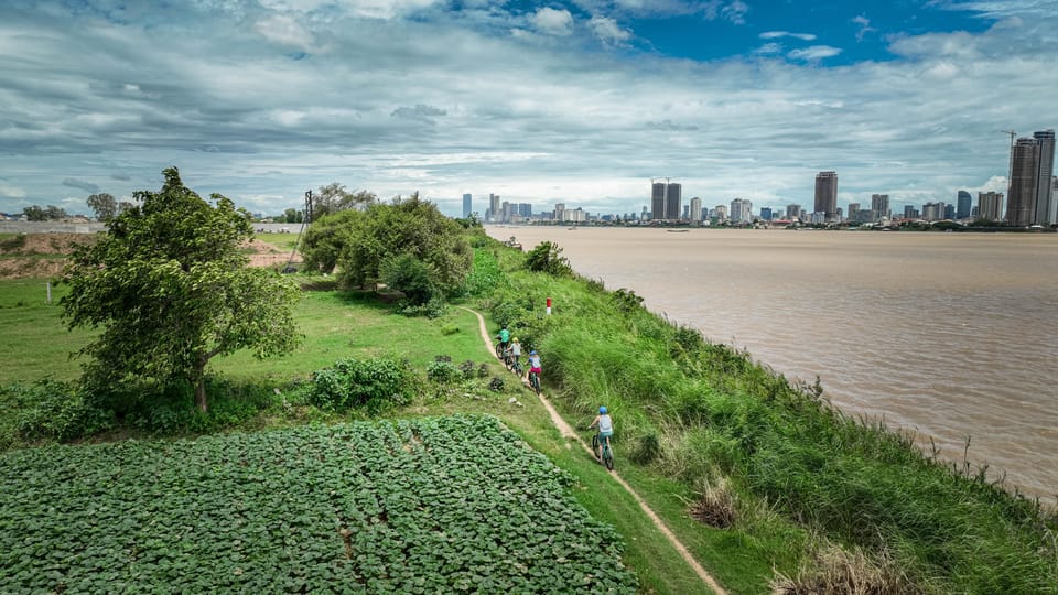 Phnom Penh: Silk Island Sunset Bike Tour Include Drinks - Booking and Cancellation Policy