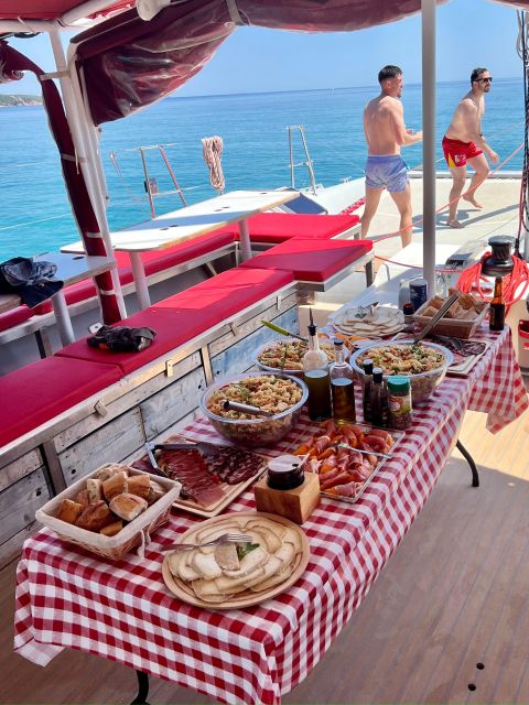 Santa Giulia: Cruise on a Maxi-Catamaran Under Sail - Booking Information