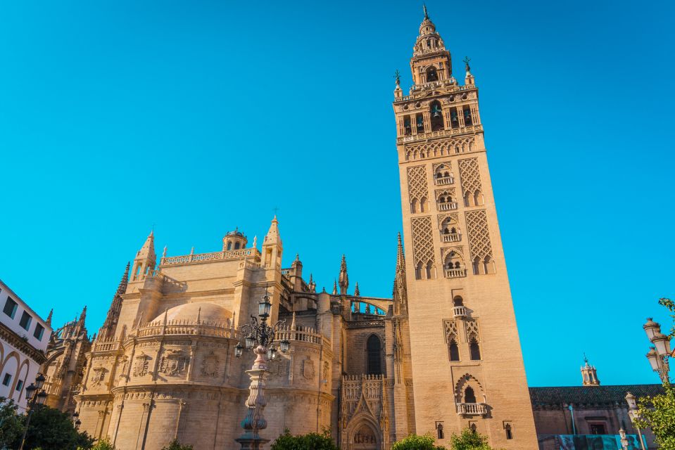 Seville: Alcázar, Cathedral and Giralda Tour With Tickets - Climbing the Giralda Bell Tower